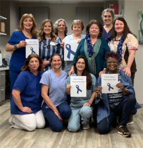 Teammates wear blue in recognition of Colorectal Cancer Awareness
