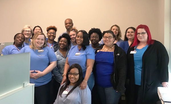 Teammates wear blue in recognition of Colorectal Cancer Awareness