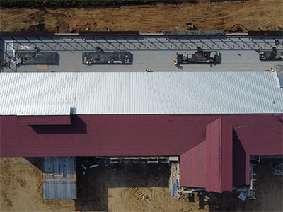Sawmill building metal roof progress April thumbnail